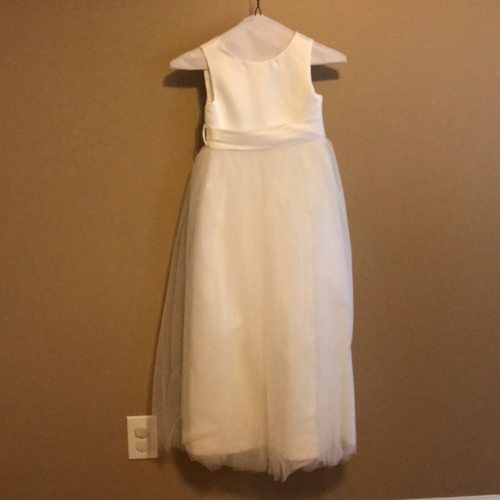 Flower girl dress-like new, worn once and dry cleaned.